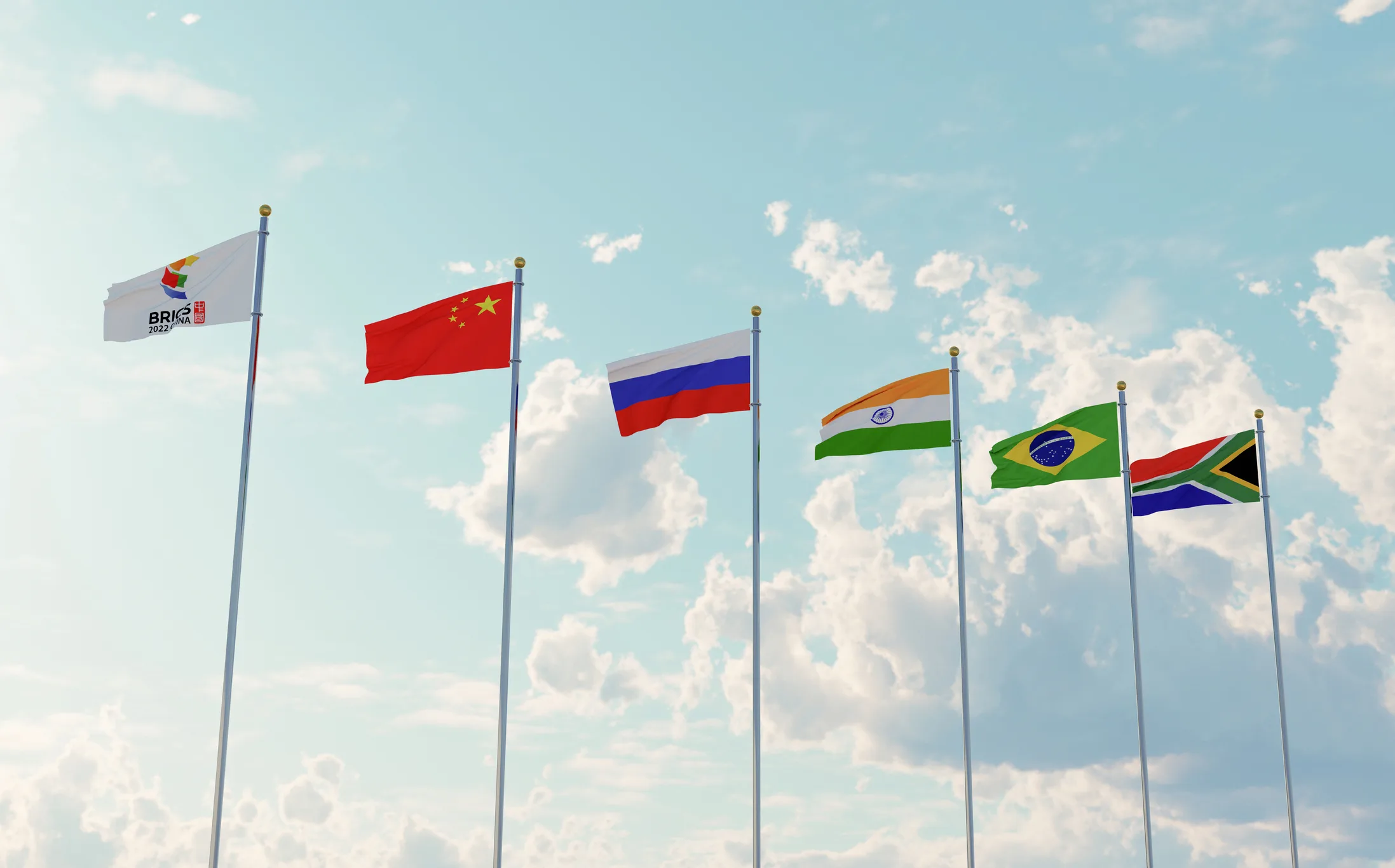 Flags of BRICS member countries—China, Russia, India, Brazil, South Africa—highlighting the bloc’s symbolic unity amid growing geopolitical tensions.
