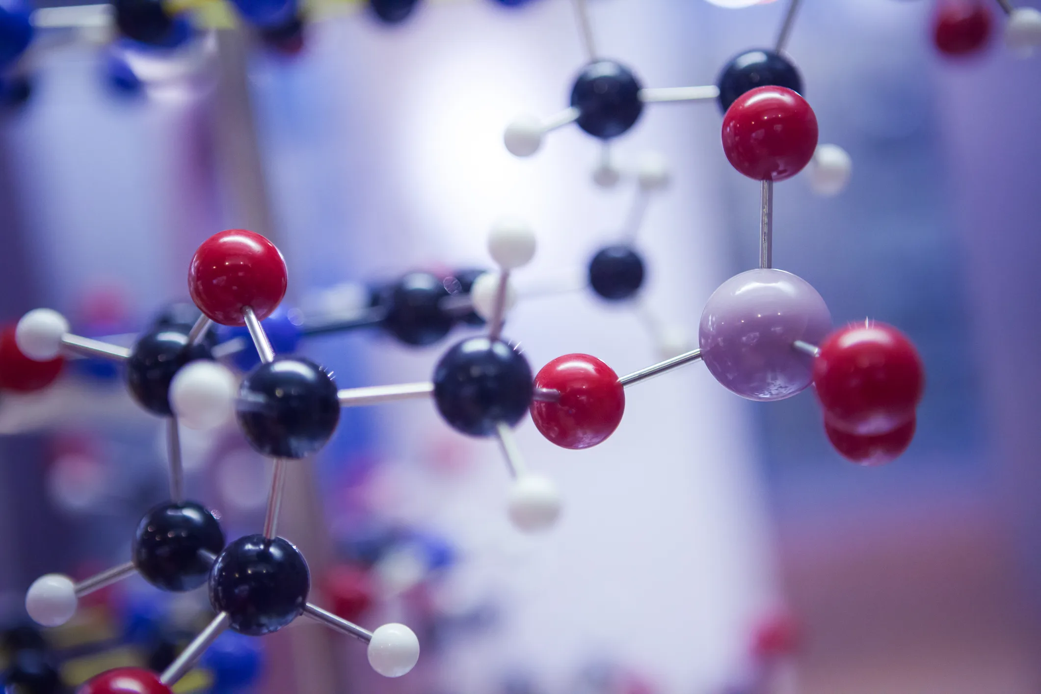 Close-up of a molecular structure model, symbolizing how business models function as adaptive, living systems in constant change.