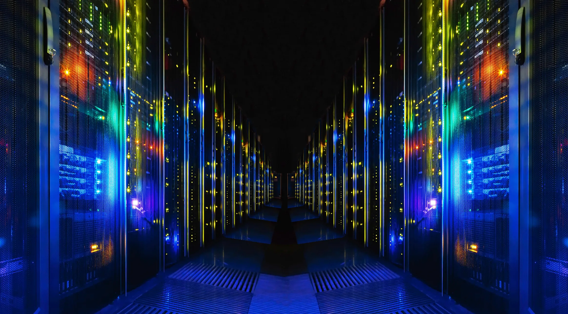 Futuristic data center with illuminated servers and blue LED lights, representing Europe’s new AI factories and supercomputing hubs.